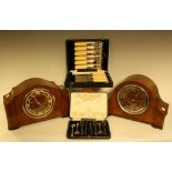 Two mantel clocks; a set of fish knives;