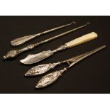 A pair of Art Nouveau silver glove stretchers,