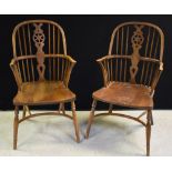 A pair of Country House Windsor type elbow chairs, wheel splats,