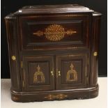 An Indian inspired hardwood drinks cabinet,