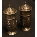 An Edwardian silver Art Nouveau cruet set, salt and pepper pots, William Aitken,