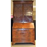 A George III mahogany bureau bookcase,