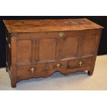 A 19th century oak four panel mule chest, brass drop handles, 131.