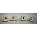 A set of four Hammersley ornithological coffee cans and saucers, retailed by Rowland Ward,