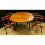 A retro mid-20th century design extending dining table;