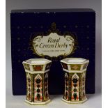 A pair of Royal Crown Derby 1128 Imari hexagonal bud vases,