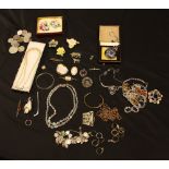 Jewellery & Watches - a silver charm bracelet suspending twenty eight assorted charms; brooches,