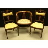 A pair of Edwardian mahogany and marquetry drawing room chairs;