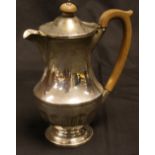 A silver hot water jug, waisted form, Henry Clifford David, Birmingham 1931,