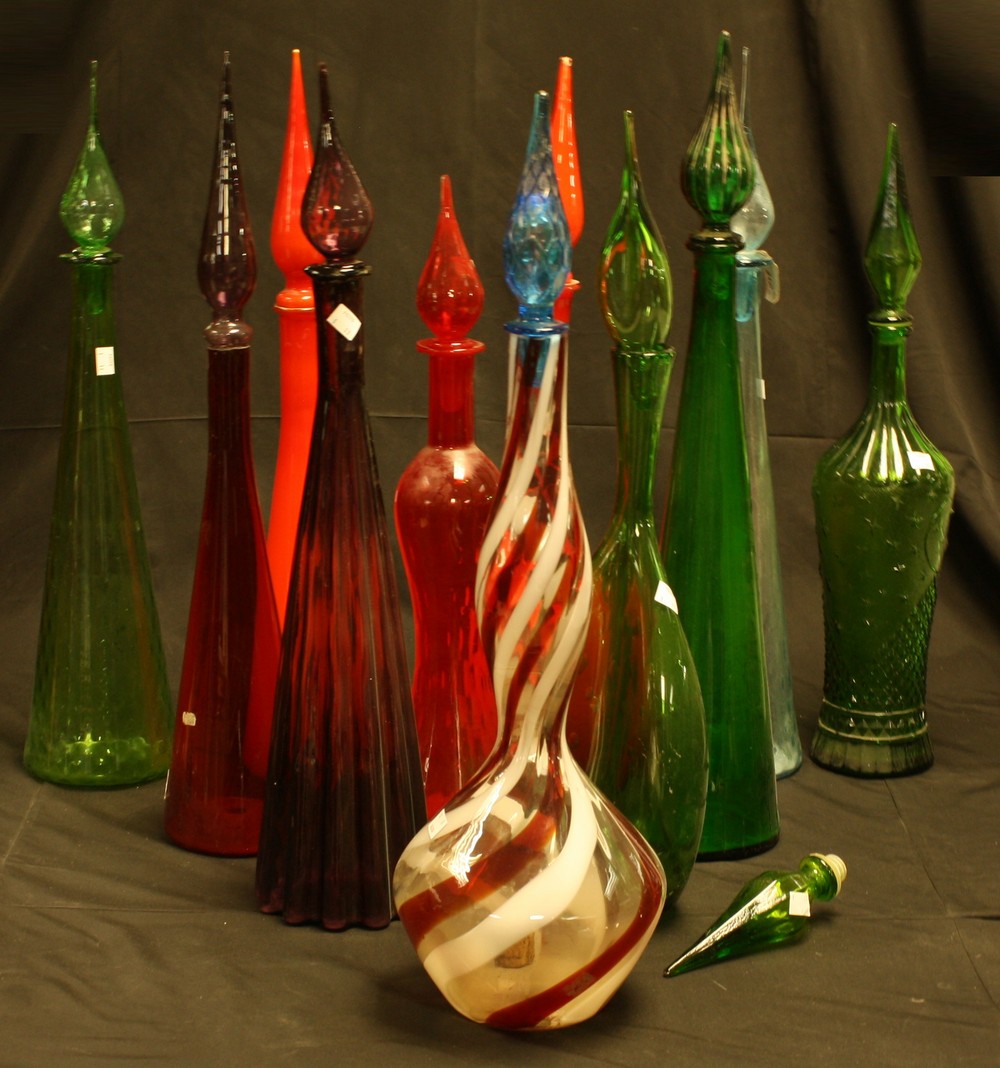 A quantity of mid 20th century coloured glass decanters,