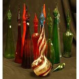 A quantity of mid 20th century coloured glass decanters,