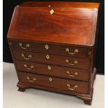 A 'George III' mahogany bureau, fall front enclosing a writing surface, small door, small drawers,