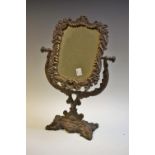 A Coalbrookdale style cast metal dressing mirror,