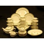 A Royal Worcester Devonshire pattern part dinner and tea service comprising dinner plates,