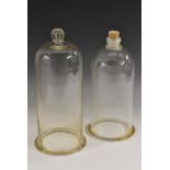 Laboratory Apparatus - a clear glass vacuum bell jar, 35cm high; another,