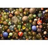 A collection of 19th century and later glass marbles, various opaque and clear glass,