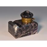 An Amethyst quartz inkwell, hinged cover, dished pen rest,
