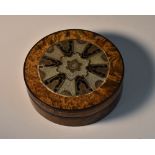 An early 19th century century faux walnut circular snuff box,