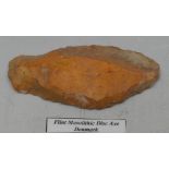 Antiquities - Stone Age, a Danish orange-brown flint disc axe, 9cm long, collector's label,