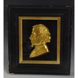A 19th century gilt metal political portrait plaque, depicting Benjamin Disraeli,