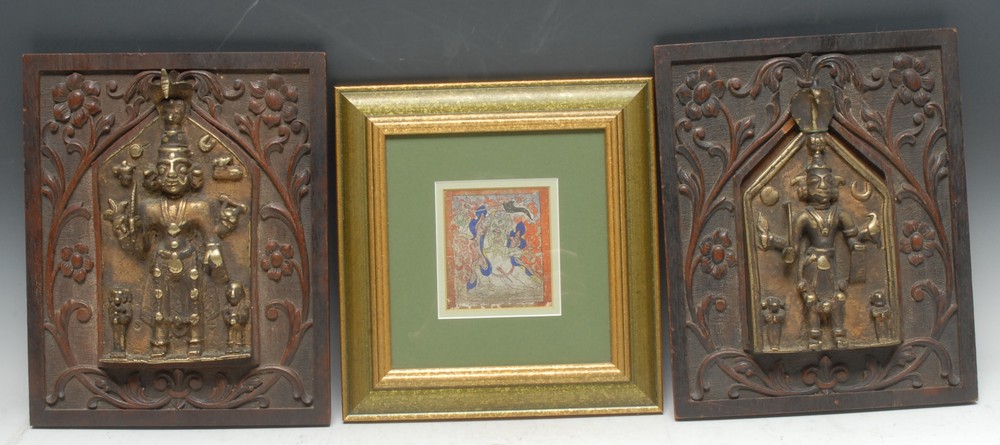 A near pair of Indian gilt-patinated bronze figural panels,