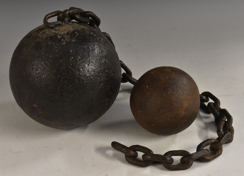 A 19th century cast iron ball and chain,