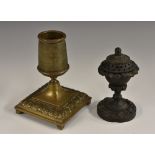 A Regency dark patinated bronze urnular pedestal pastille burner, cast with lotus, pierced cover,