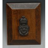 A 16th/17th century lead boss or fitting, cast as Tudor Rose royally crowned, 10cm x 5.