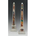 A pair of pietra dura obelisks, inlaid in malacite, lapis lazuli and furgther specimen stones,