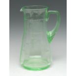 An early 20th century uranium glass water jug,