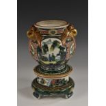 A Chinese porcelain censer and stand, painted in polychrome with figures in monumental landscapes,