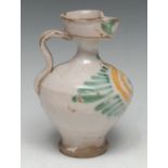 A Continental tin-glazed earthenware baluster jug, probably German,