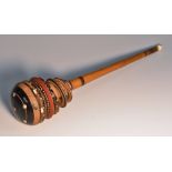 An Indian chip-carved and painted softwood rattle, 28.