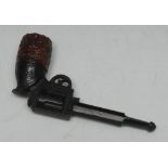 Tobacco - a novelty pipe, as a revolver,