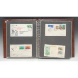 Stamps - Queen Elizabeth II Commonwealth first day covers and commercial mail in album,