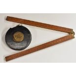 A brass and blued steel 66 foot tape measure, by John Rabone & Sons, Birmingham,