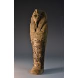 A museum-type compostion model, of an Egyptian shabti,
