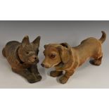 A French papier mâché nodding model, of a dog, 29cm long; another,