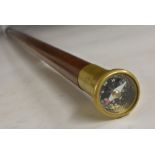 A gentleman's novelty walking cane, the brass pommel with a compass, hardwood shaft, 84.