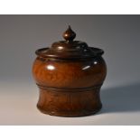 Treen - a 19th century turned lignum vitae tobacco jar, 12cm high, c.