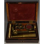 A 19th century lacquered brass monocular field microscope, rack-and-pinion adjustment,