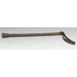 An Edwardian leather huntsman's riding crop, by Swaine & Adeney, London, weighted pommel,