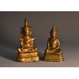 A Chinese/Siamese gilt metal domestic shrine figure, of Buddha, seated in a lotus,