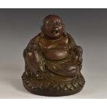 Chinese School (19th century), a brown patinated bronze, the rotund Budai,