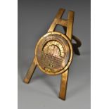 A Negretti & Zambra perpetual easel desk calendar, 8cm register inscribed "Come what may,