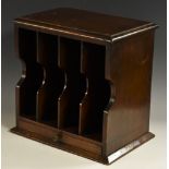 An Edwardian mahogany correspondence cabinet, moulded rectangular top above shaped letter divisions,