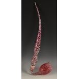An oversized 19th century Nailsea novelty cranberry and white glass pipe, of typical form,