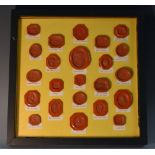 An arrangement of wax seal matrix impressions, various Grand Tour and heraldic subjects, 26.