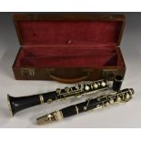 An early 20th century rosewood clarinet, by Lewin Freres, Paris, retailed by S A Chappell, London,