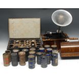 An Eddison Standard Phonograph, 12.5cm cylinder, oak case with bowed cover, 33cm wide, c.